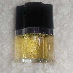 Oscar de la Renta Yellow Perfume Bottle